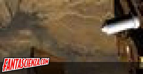 Illustrazione artistica che mostra la Mars Express mentre sgancia il guscio d'atterraggio dentro il quale si trova il Beagle 2.